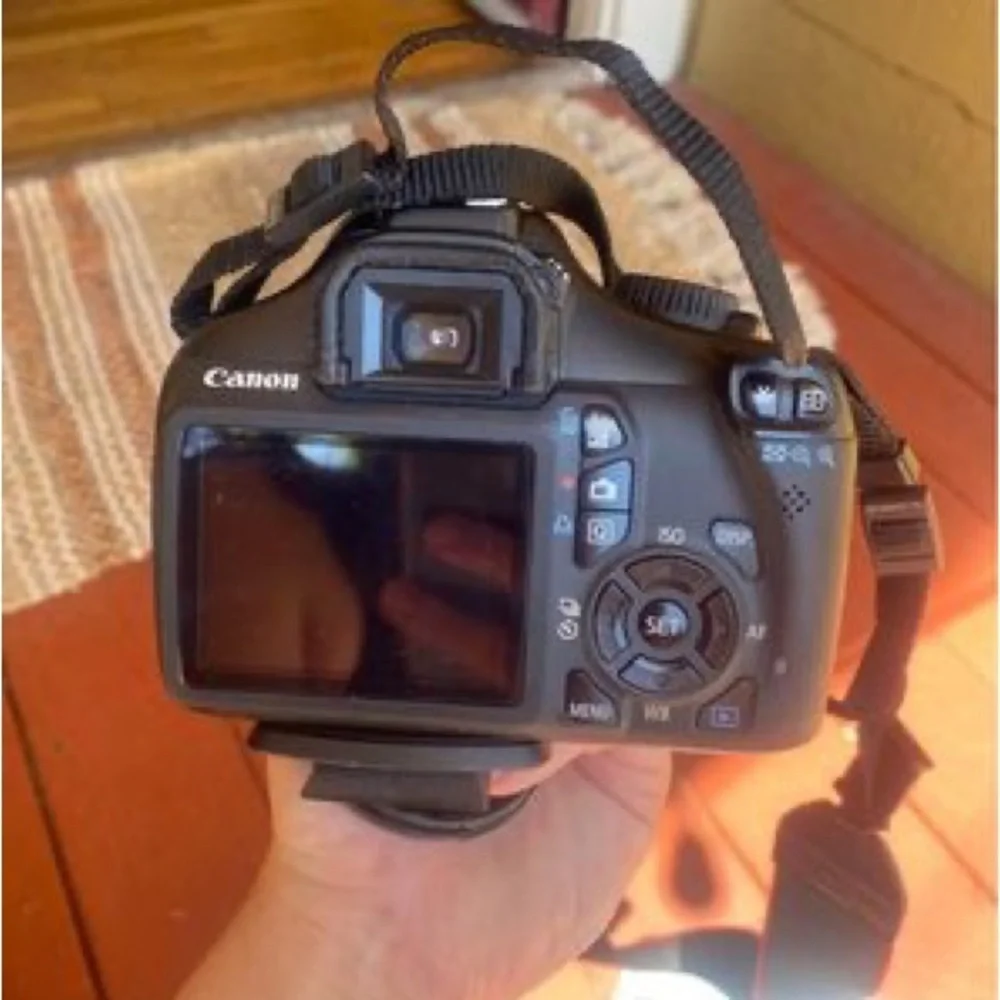 Canon Rebel EOS T3 Camera, Rebel Gadget Bag, Battery Charger, extra 55-25mm lens